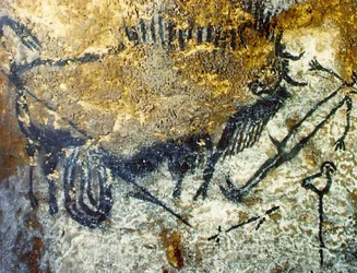 Um bisão ferido a atacar um homem, c. 15.000-10.000 a.C.